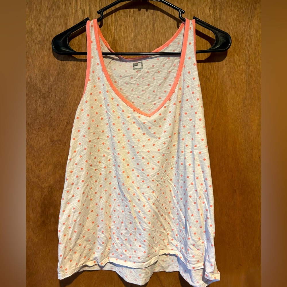 Set of 2 High Low flowy tanks.
